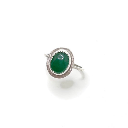 Green quartzite with serrated bezel and radiant halo size 8.5