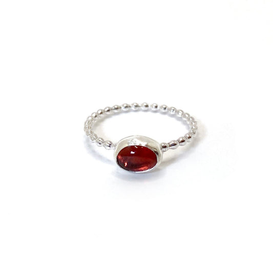 Red garnet gemstone ring with beaded sterling silver wire band